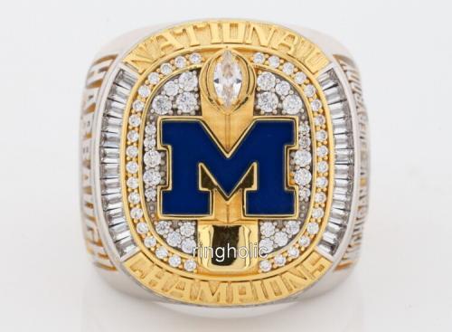 2023 Michigan Wolverines national championship ring front view with blue M logo and CZ stones